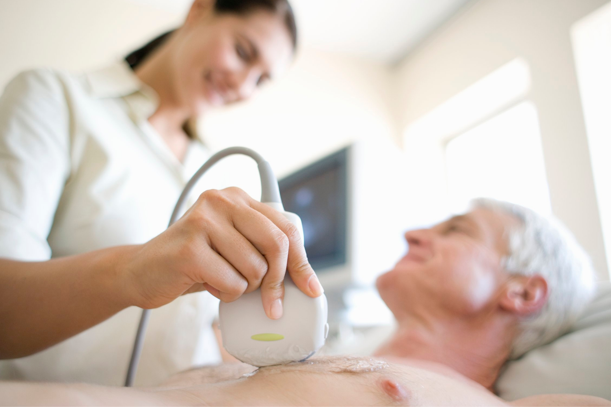 Female Doctor Doing Echocardiography on Patient | Interventional Procedure | Capital Radiology