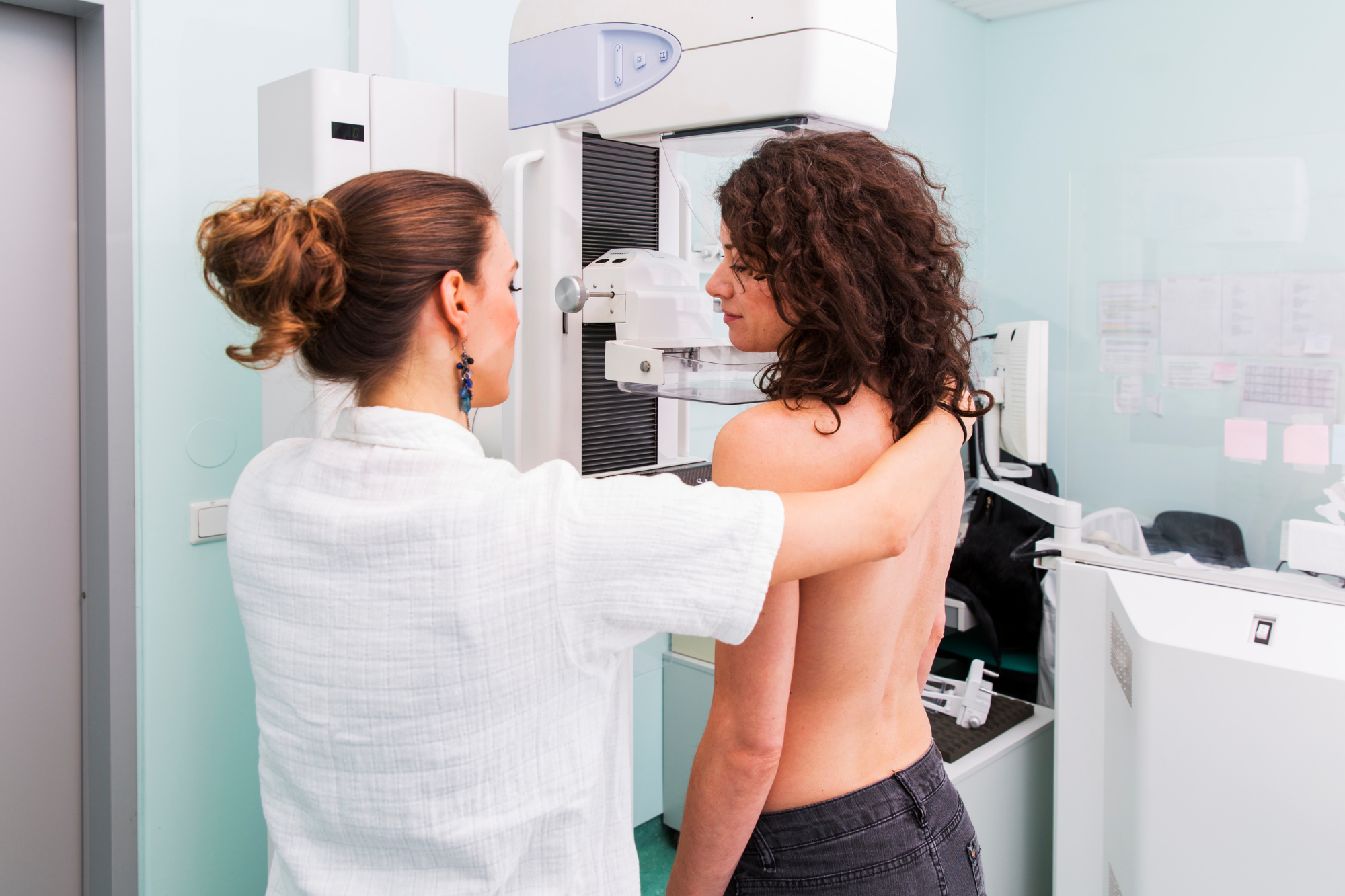 Specialist Carrying Out Ultrasound Exam of the Breast of a Patient | Chest X ray | Capital Radiology